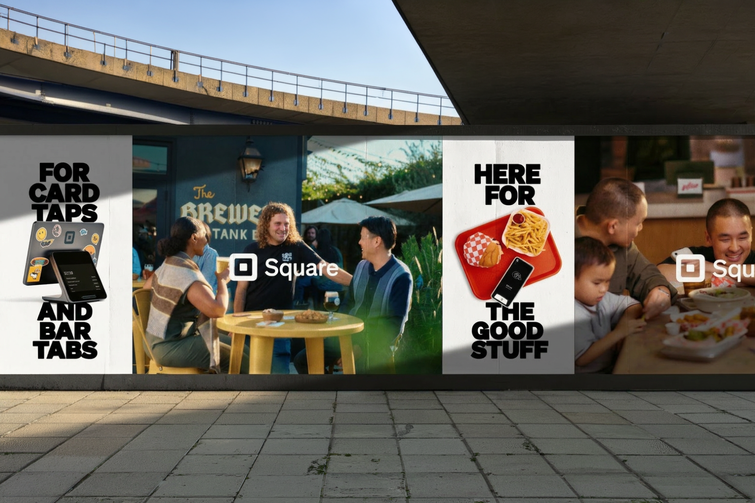 Square F&B outdoor wall — four campaign posters: For card taps and bar tabs, brewery scene, Here for the good stuff, family dining; under urban overpass